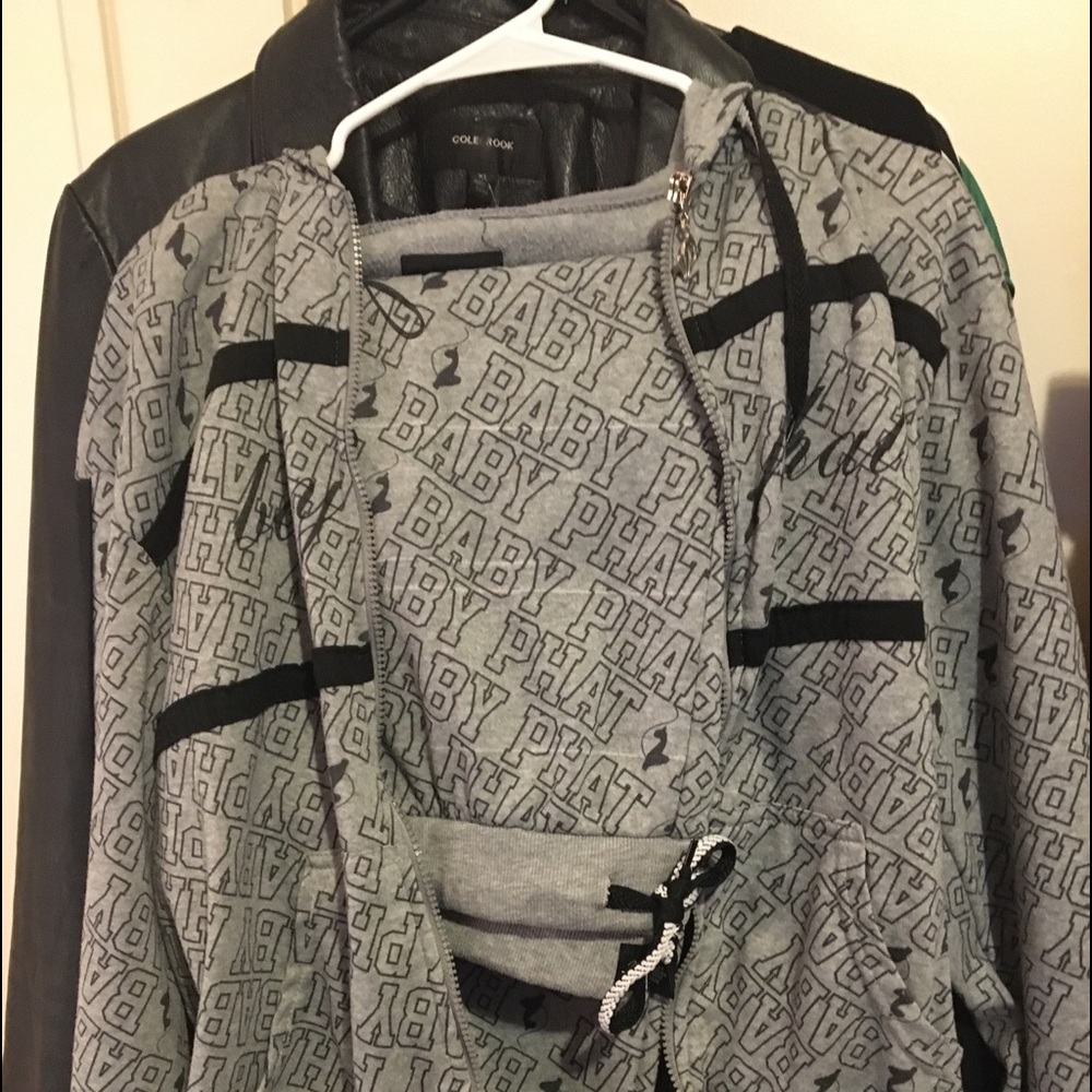 Baby phat jogging suit it’s black n grey it’s an 2x which is a xl